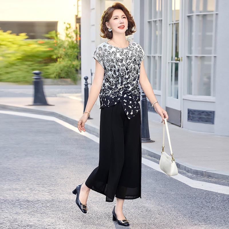 

Mom s Summer Chic Two-Piece Set: Stylish Short-Sleeve Top & Wide-Leg Chiffon Pants for Middle-Aged and Elderly Women. 5XL