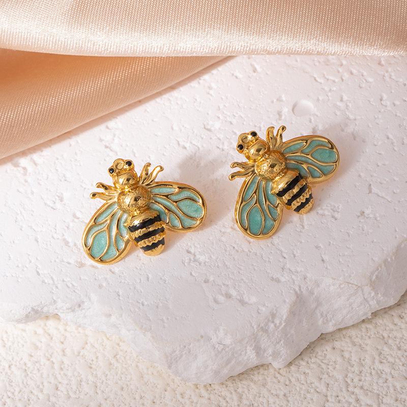 Elegantní nerezové náušnice s kapkami oleje ve tvaru včely