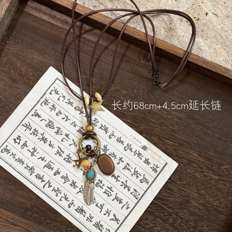 Bohemian wood beads beaded hollow round pendant necklace light luxury high-end sweater chain niche necklace accessories