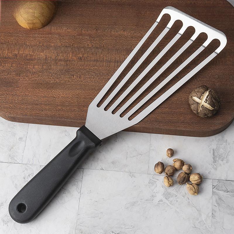 Stekspade för fisk i rostfritt stål