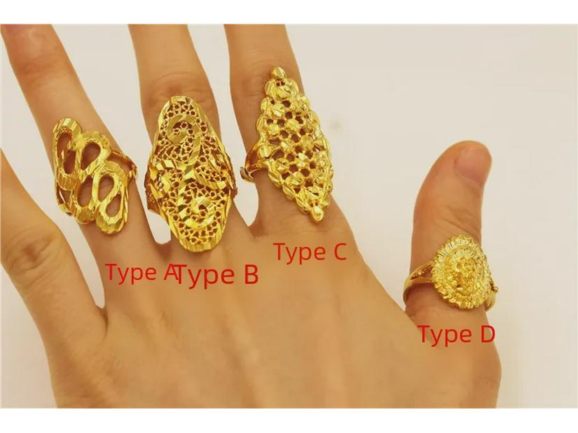 Adjustable Gold Butterfly Ring with Star and Flower Design