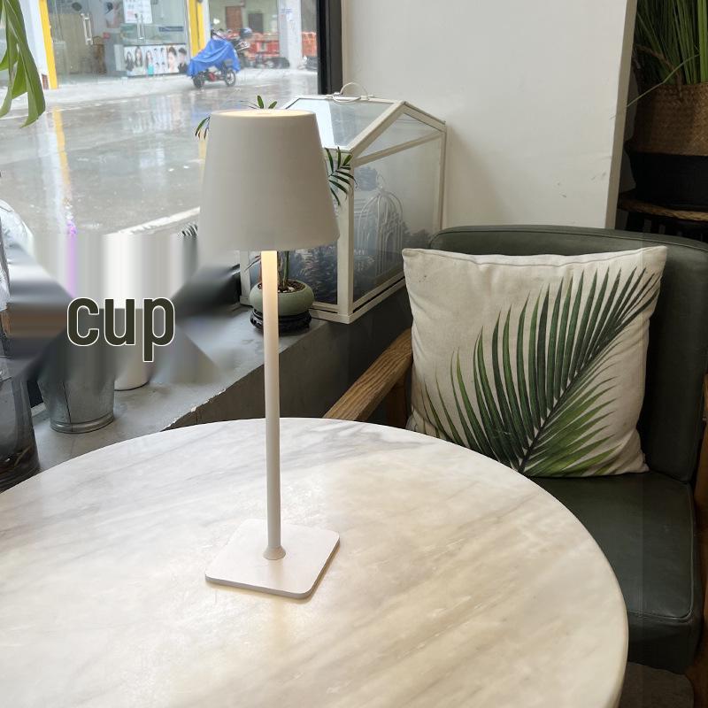 High-Legged Iron Art Black Floor Lamp with Induction Night Light for Dining Table and Bedside Ambience.