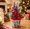 Christmas Decoration on a Stump with Snow-Covered Branches, Red Berries, and a Bow 22