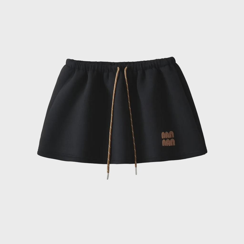 "Sweet Sports Style Mini Skirt: Elastic Waist, Air Layer Embroidery, Anti-Exposure, Versatile Sweater Material for Women."