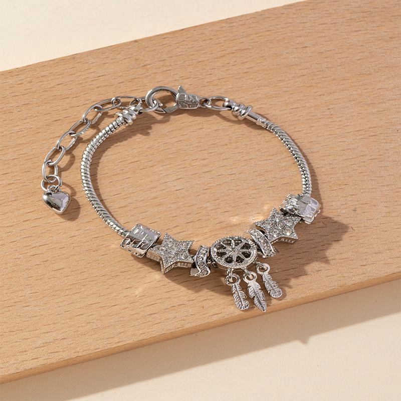 Adjustable Beaded Bracelet with Angel Wing Pendant Five Point Star Accent and Glue Rhinestone Embellishment