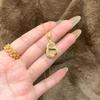 Jade Leaf Gourd Necklace - Elegant Gold Branch Design for Women, Versatile Clavicle Chain, Light Luxury Pendant