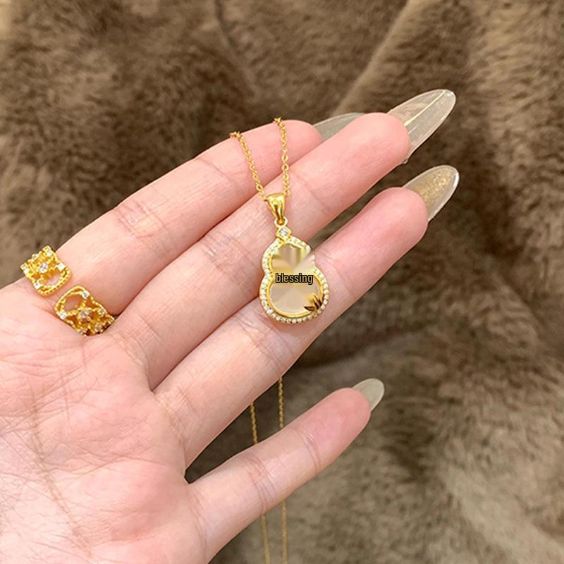 Jade Leaf Gourd Necklace - Elegant Gold Branch Design for Women, Versatile Clavicle Chain, Light Luxury Pendant