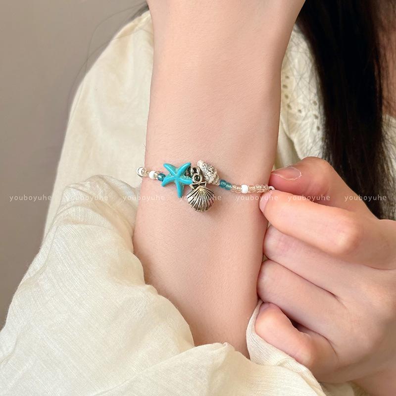 Seaside travel shell starfish bracelet female bohemian creative woven conch bracelet holiday wind hand