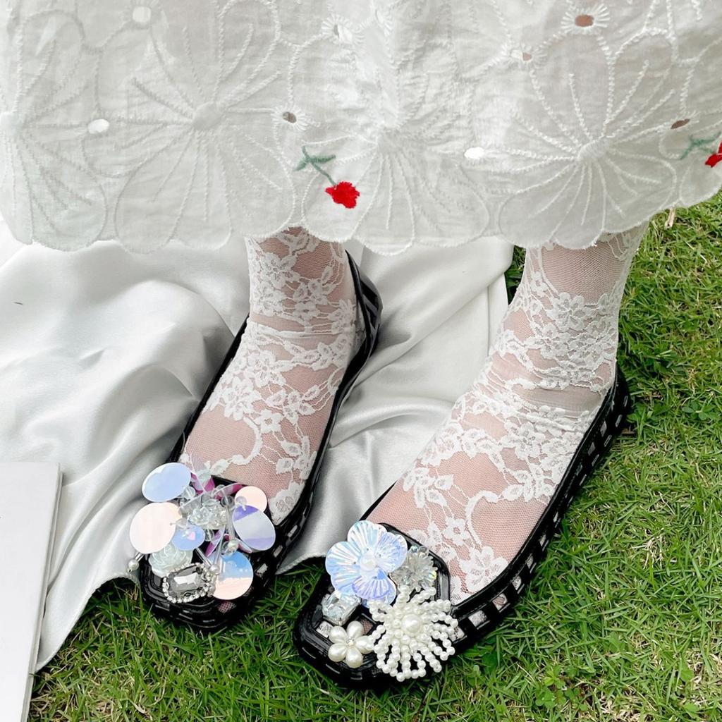 Popular Xiaoxiangfeng retro baotou flat-soled sandals women's 2025 summer outer wear skirt Korean version crystal jelly shoes