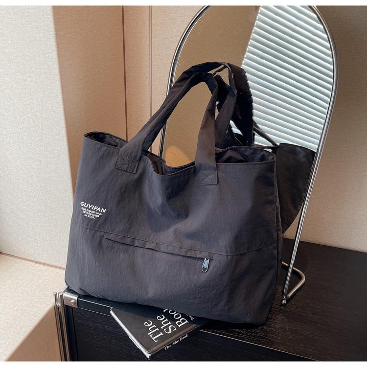 

Вместительная сумка-инструмент, повседневная ручная тканевая сумка, простая для поездок на работу, легкая и универсальная наплечная сумка, сумка-тоут для занятий для студента колледжа one size fits all чёрный