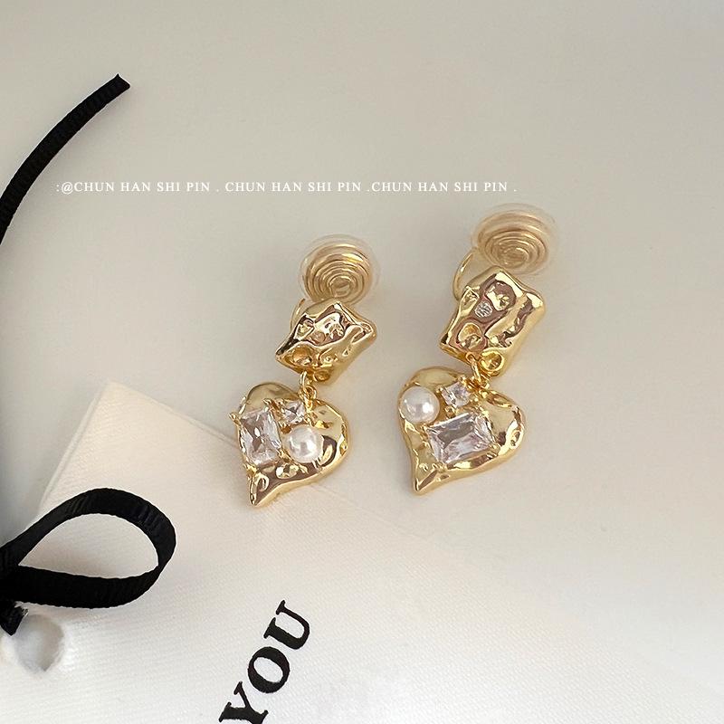 

Irregular Lava Love Pearl Ears High Temperament Niche Painless Earrings Women s Mosquito Coil Disc Silicone Earrings