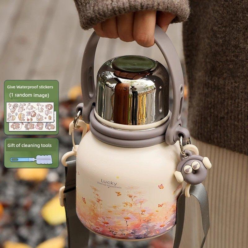 

Water Bottle, Large Capacity Thermos Cup for Girls, with Handle, High Aesthetic Value, Premium Feel, Stainless Steel Tea Brewing Cup for Students Lucky Daisy 600ml Comes with Cup Brush + Sticker