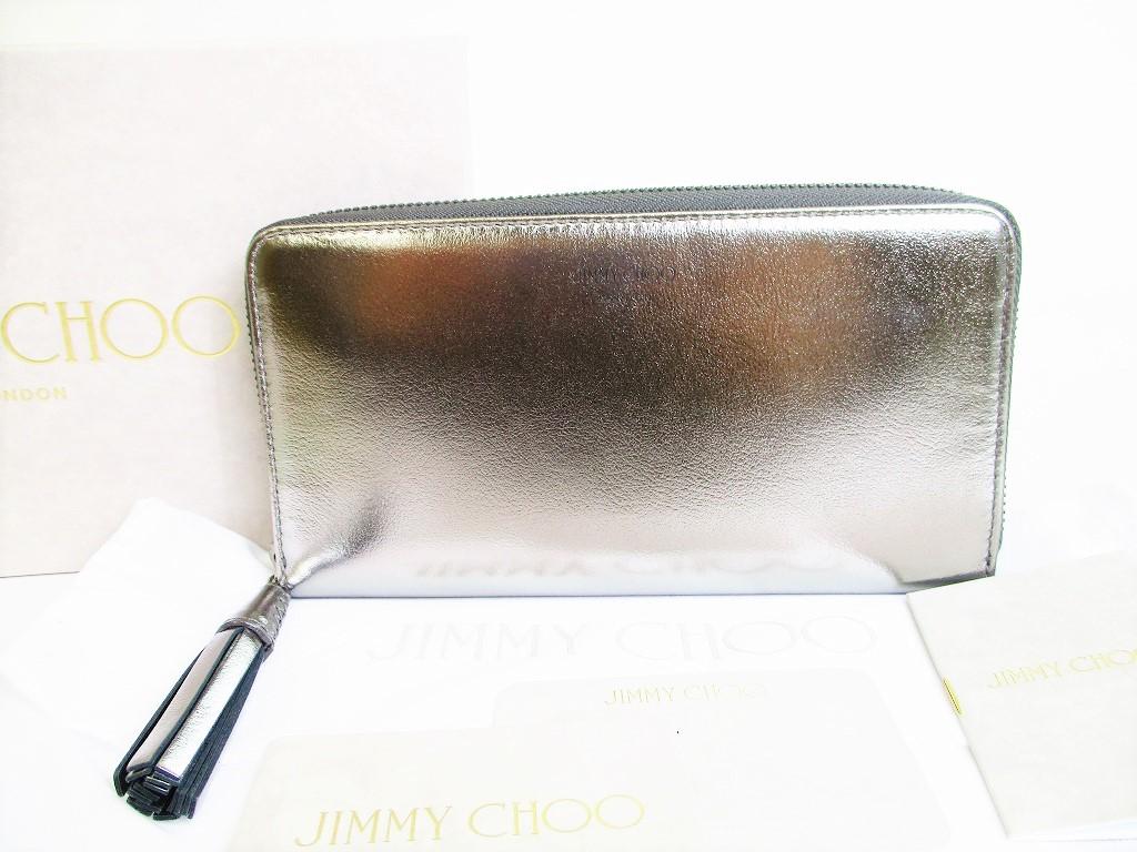 

Автентичний гаманець Jimmy Choo зі сріблястою металевою телячою шкірою на круглій блискавці №8148 відремонтований