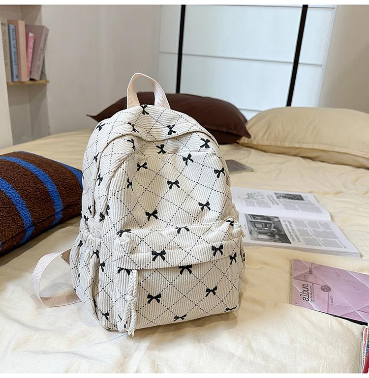 Schoolbag corduroy bow small backpack girls high value small schoolbag simple ins wind small casual backpack women