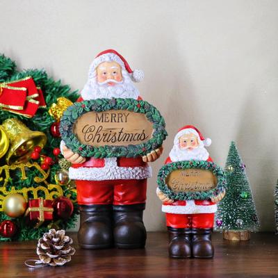 Santa Claus Resin Figurine with Merry Christmas Sign - Festive Home Decoration