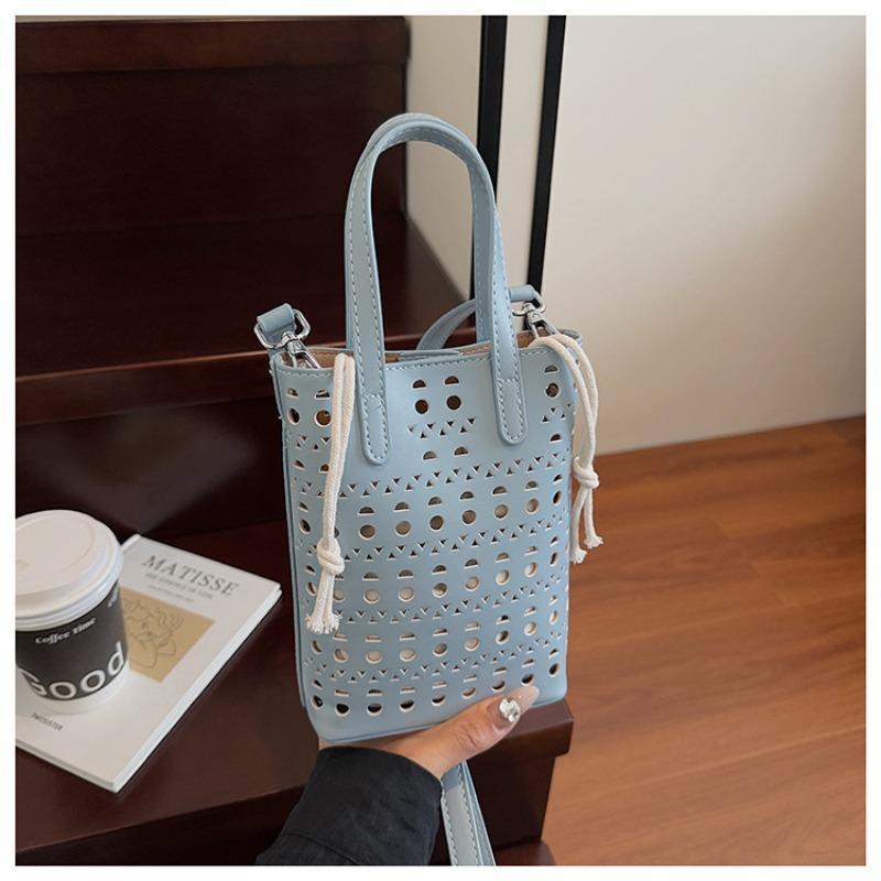 Niche bag women's new summer fashion hollow messenger mother bag portable mobile phone bag
