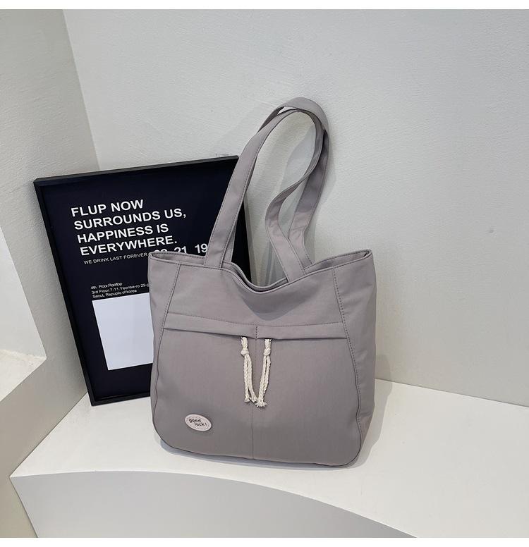 

Premium canvas bag women s large capacity 2025 summer new casual versatile student class commuting shoulder bag