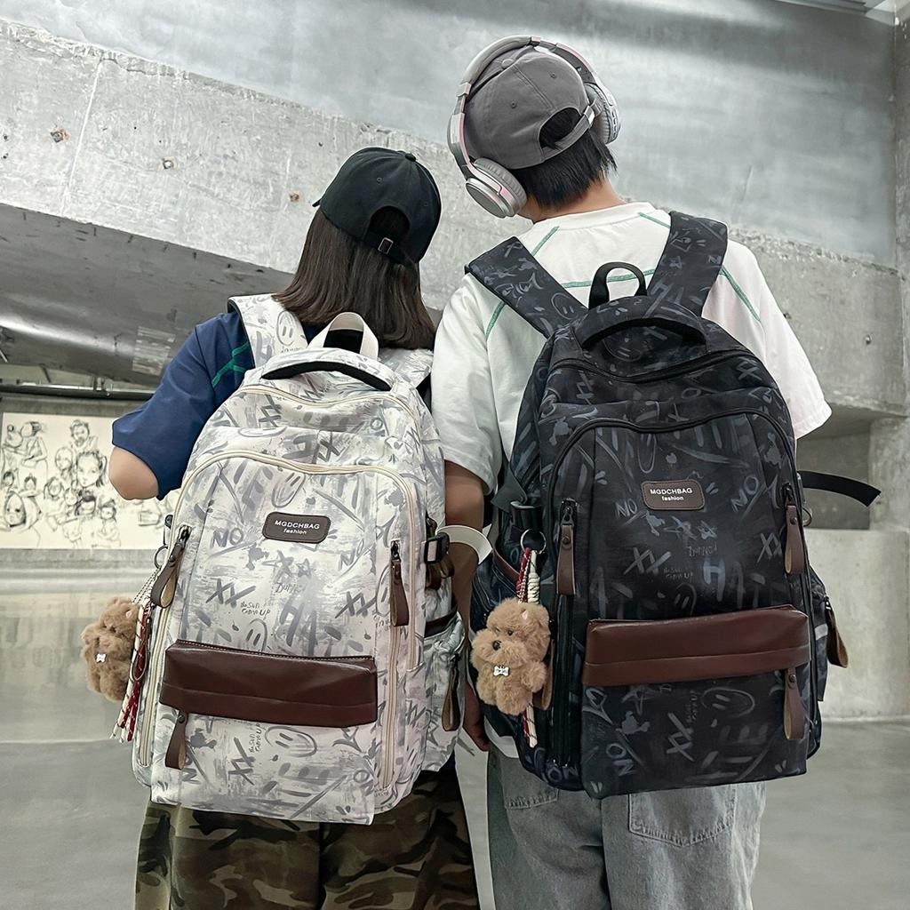 Bolsa para la escuela: Mochila para estudiante de secundaria, mochila para hombre, graffiti estilo coreano, gran capacidad para estudiante de secundaria, alivio de peso, protección de la columna vertebral
