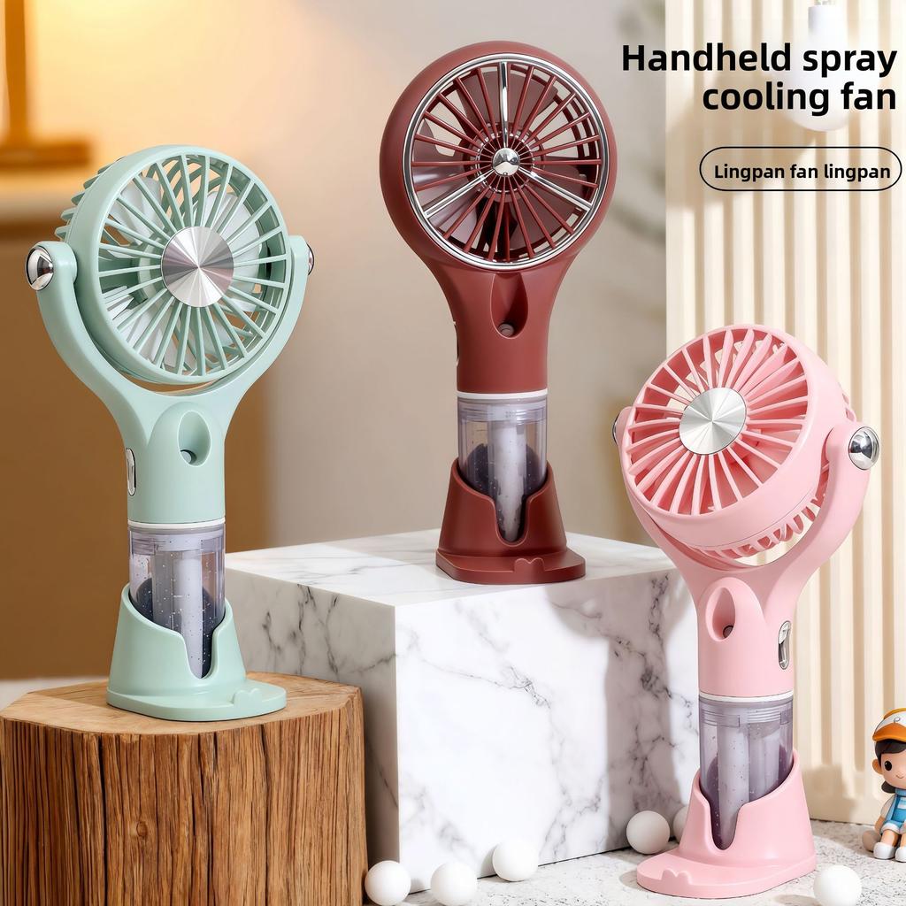 Creative New Model Handheld with Base Spray Electric Fan for Outdoor Travel, Sun Protection, Hydration, and Infinitely Adjustable Speed.