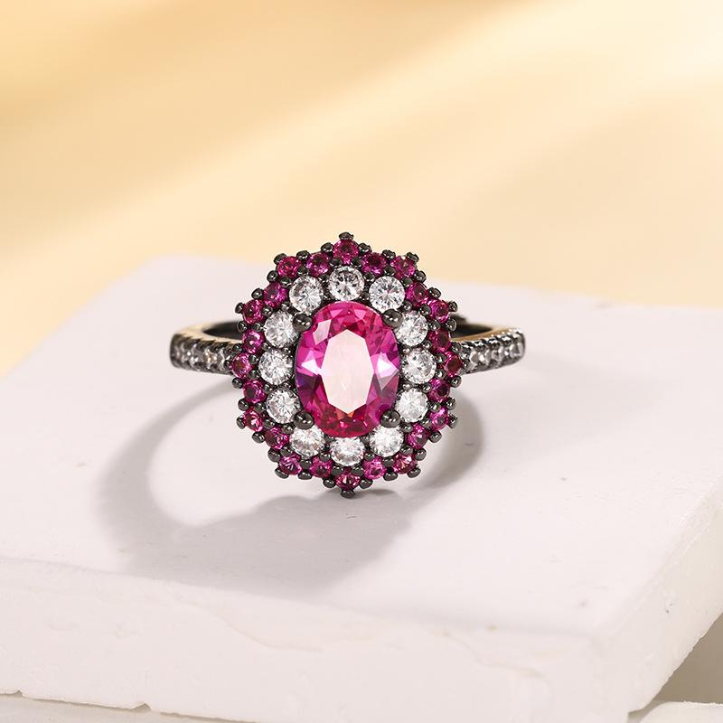 

Ювелирные изделия Медное основание Позолоченное Имитация Красного Корунда Овальный Черное Золото Комплект Камень Героини 6 * 8