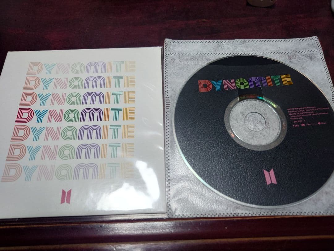 

[USED] BTS Dynamite CD includes 10 songs