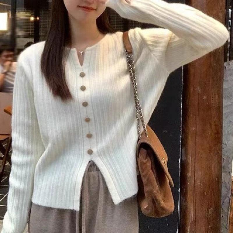 

Casual versatile sweater women s autumn and winter loose pullover design sense hem split fork solid color V-neck knitted sweater women 410-121 (one size) білий