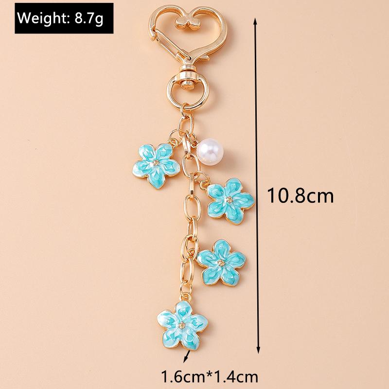 Niedlicher Emaille Perlen Blume Schlüsselanhänger Pflanze Schlüsselring Anhänger für Frauen Mädchen Handtaschen Deko DIY Handgemachter Schmuck Geschenke