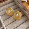 French pearl stud earrings women's medieval earrings gold spiral circle design high-end temperament European and American earrings sterling silver