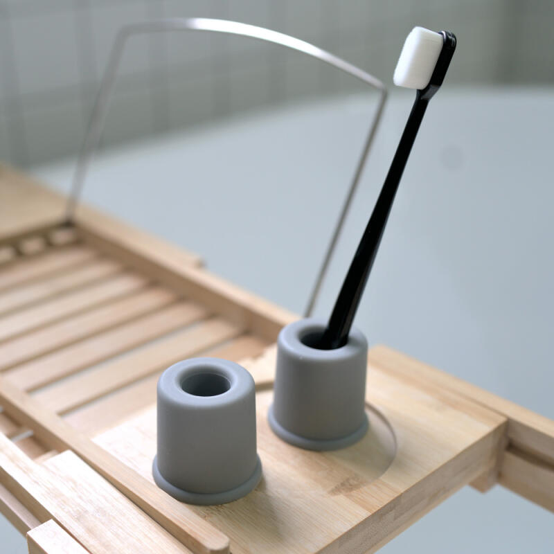 

2 soft silicone toothbrush holders gray