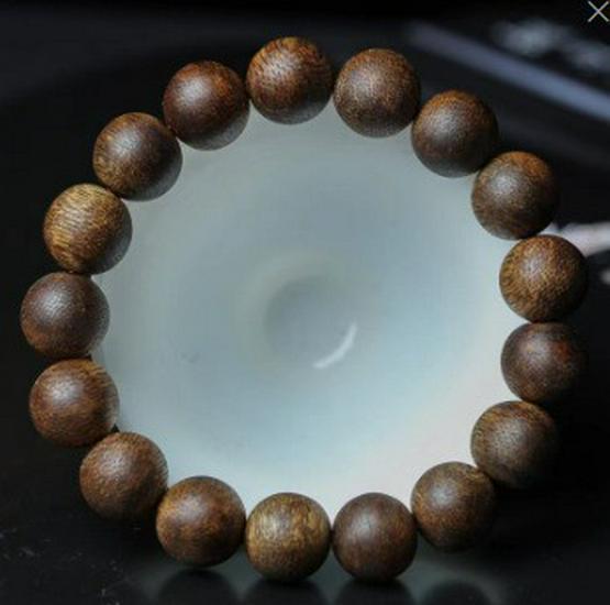Agarwood Black Qinan High Oil Sinking Bracelet: 108 Bead Buddhist Rosary with Round and Barrel Beads, High-Quality Woody Hand Jewelry.