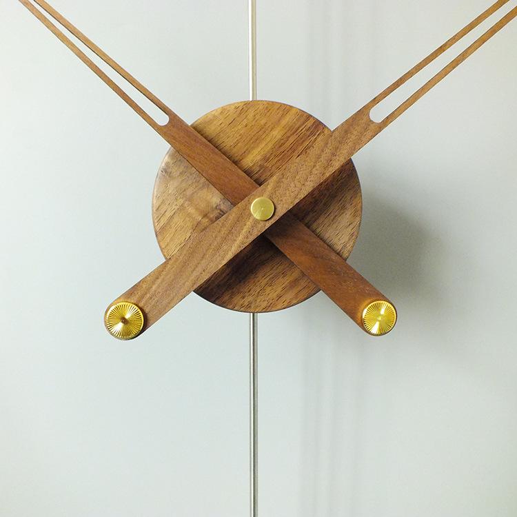 Nordic Minimalist Spanish Nomon Wall Clock in Black Walnut with Large Copper Pointer - Ideal for Hotel and Living Room Decor