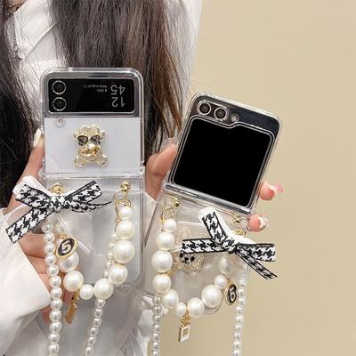 Capa de celular dobrável com corrente de mão de pérola de laço para Samsung Galaxy Z Flip 3 Galaxy Z Flip 4 Galaxy Z Flip 5 capa de celular de desenho animado totalmente envolvente