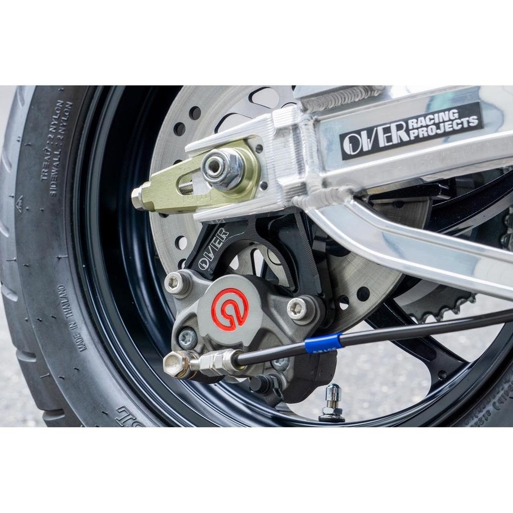 OVER Racing Rear Caliper Support, Black, Brembo 2-Piece (Crab) Lower, for DAX125, 83-123-21B