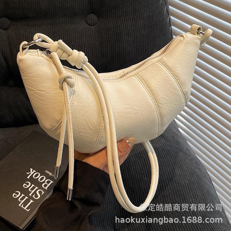 Super fire niche splicing bag women's 2025 new spring and summer versatile messenger dumpling bag popular croissant bag