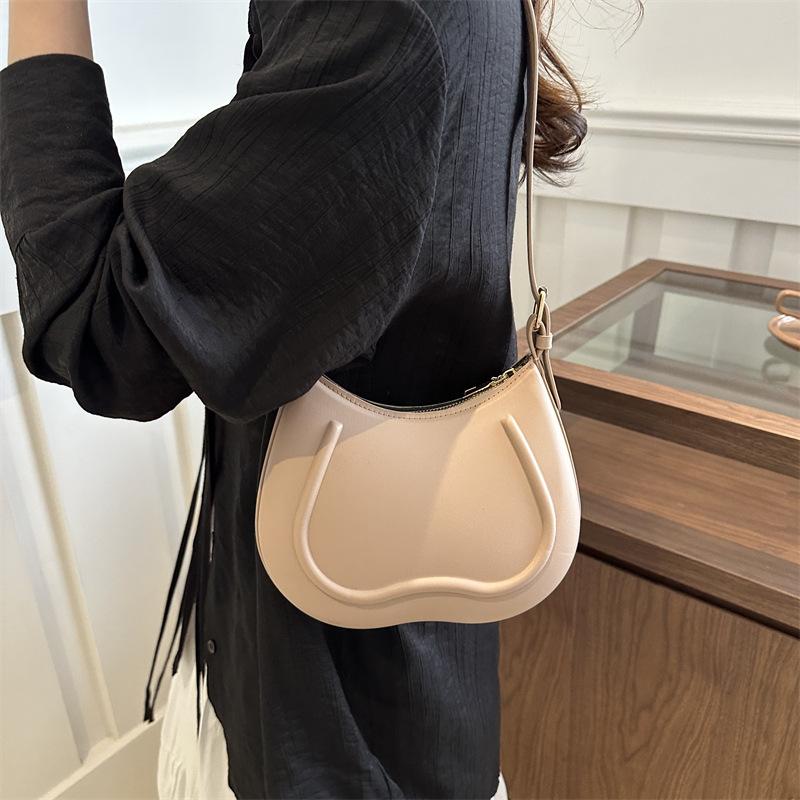 Výklenková a módní jarní kabelka do podpaží, nová textura, všestranná kabelka přes rameno, jednoduchá a módní dámská kabelka