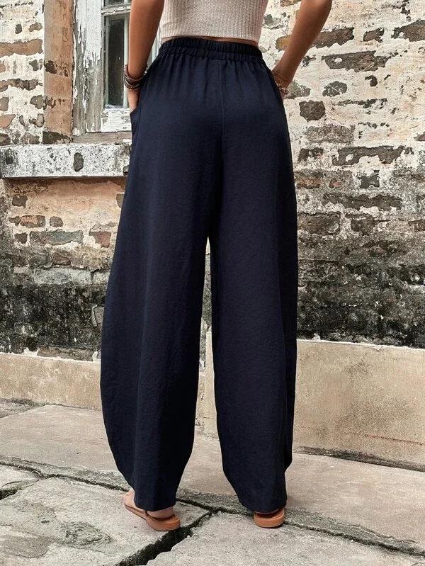 Women's Solid Color Casual Pants with Pockets and Elastic Waist.