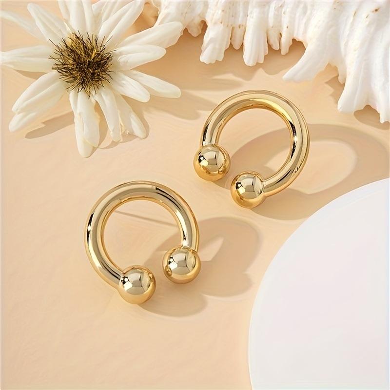 

Stylish and simple, colorful horseshoe rings, personalized niche women s stud earrings, simple and high-end design, candy-colored earrings.