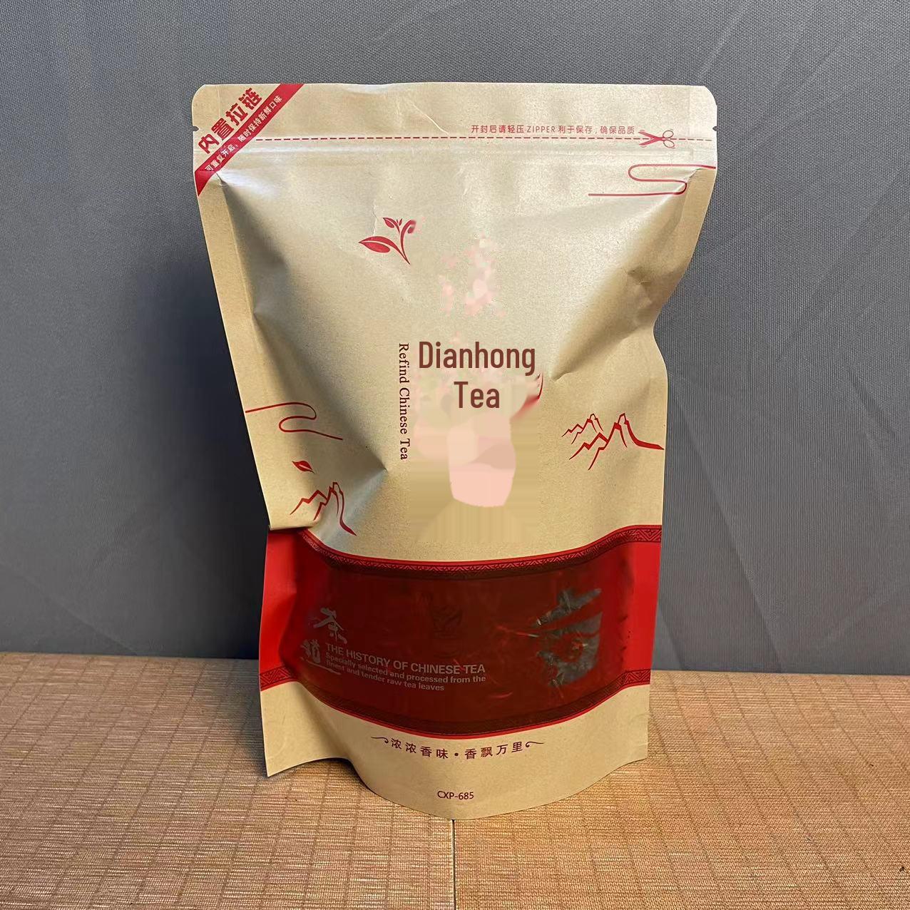 

Черный чай из древнего дерева с медовым вкусом Fengqing Dianhong 250g leather bag