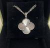 18K Gold-Plated V Design Four-Leaf Clover Necklace with Rose Red Chalcedony, Agate, and White Shell Pendant