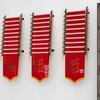 Brocade Multi-Layer Flag Display Stand for Schools, Hospitals, and Exhibitions – Movable Floor-Standing Rack