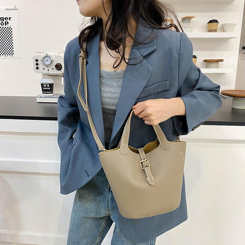 Spring and summer new fashion portable bucket tote bag simple atmosphere shoulder messenger bag casual versatile commute