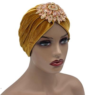 Cappello turbante di lusso in velluto con strass e fiori da donna