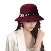 Autumn and winter new women's woolen top hat Hepburn style small brim basin hat pearl decoration French retro fashion shows small face
