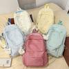 Design sense dopamine embroidery large capacity junior high school bag ins niche female high school student lightweight backpack