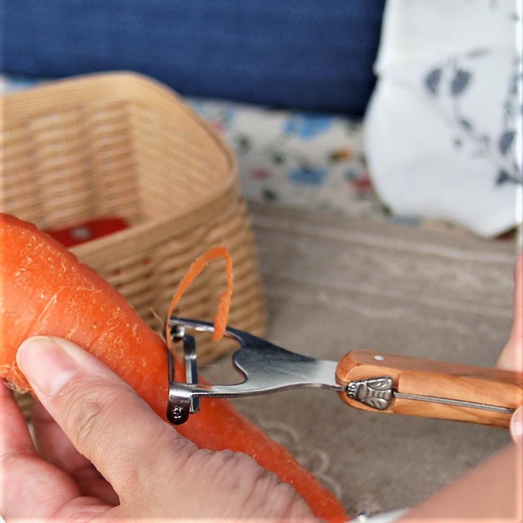 The NERON Peeler Features a Comfortable Wooden Handle and Laguiole Olive Made In This Peeler Combines the Elegant Design and Artisanal Sharpness of a