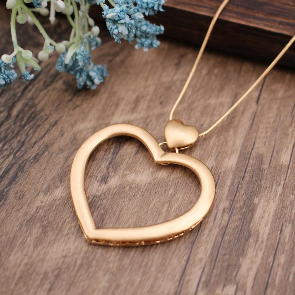 Hollow geometric flower love long necklace, women's exaggerated high-end irregular brushed pendant