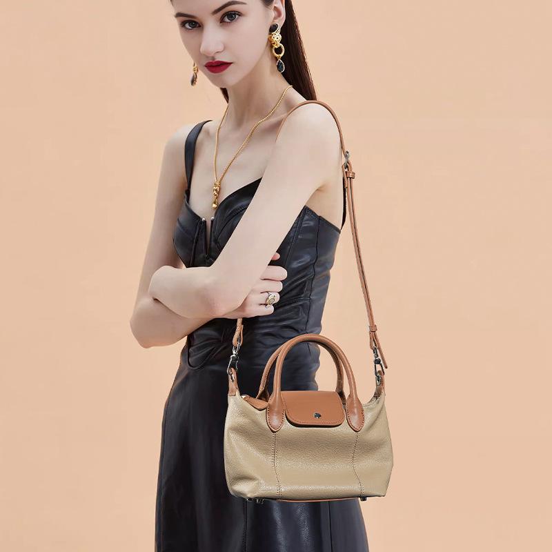 The first layer of cowhide fashion dumpling bag, versatile leather high-end color contrast large-capacity handbag women
