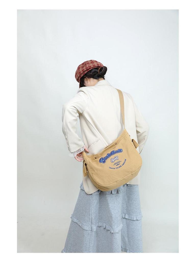 Korean Trendy Canvas Messenger Bag: Large Capacity for Women & Men, Sports Style