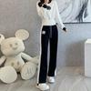 European & American Camellia Knit Leisure Suit: Women's Fashionable Western-Style Wool Sweater & Wide-Leg Pants Set