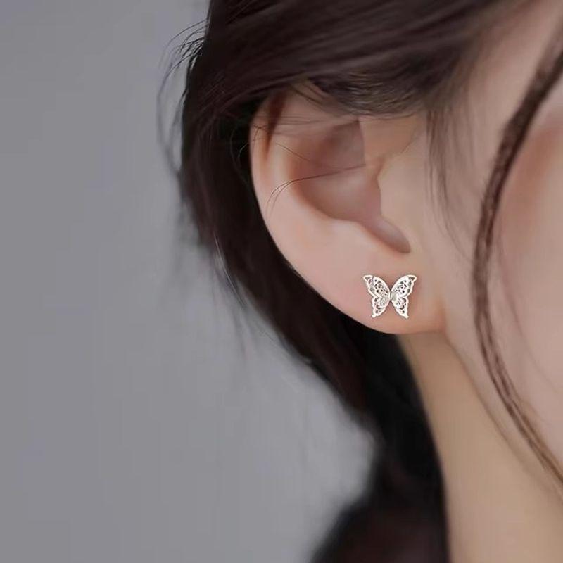 

Silver Double Layer Butterfly Studs New Arrival Best Selling Accessible Luxury Special Interest Earrings Fancy Female Earrings Temperament Wild A pair of double butterfly earrings